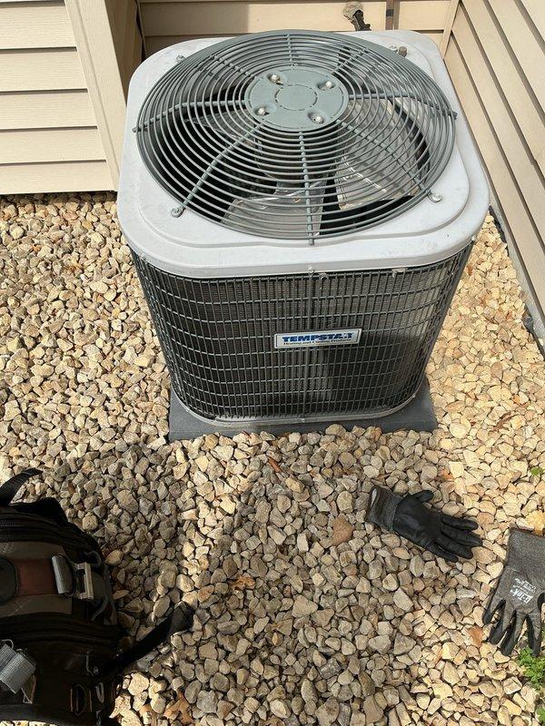 Completed comprehensive air conditioning tune-up on residential split system, including inspection of indoor air handler unit in attic and outdoor condenser unit. Installed locking refrigerant line caps on outdoor unit to prevent tampering and unauthorized refrigerant access, which were previously missing from the system.