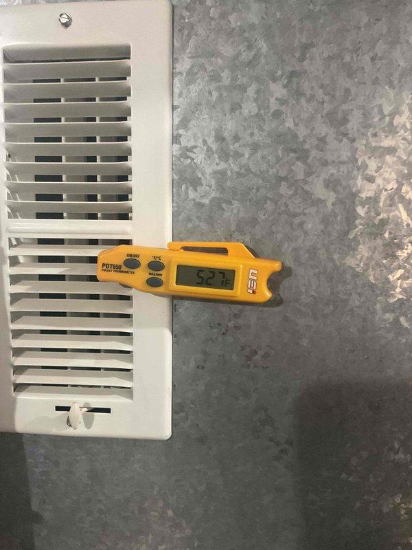 Responded to no cooling callback on 12-year-old air conditioning system. Upon arrival, found indoor fan operating in 17-minute cycles but unit not cooling. Investigated thermostat settings and discovered fan was set to "circulate" mode rather than "auto" mode, causing fan to cycle independently of cooling operation throughout the hour. Verified system operation with temperature measurements showing proper airflow at supply register (82.9°F) and refrigerant line temperature (35.8°F), confirming compressor and cooling functions working as designed. Adjusted thermostat from circulate to auto mode to restore normal operation. System now functioning properly with fan only running during active cooling cycles.
