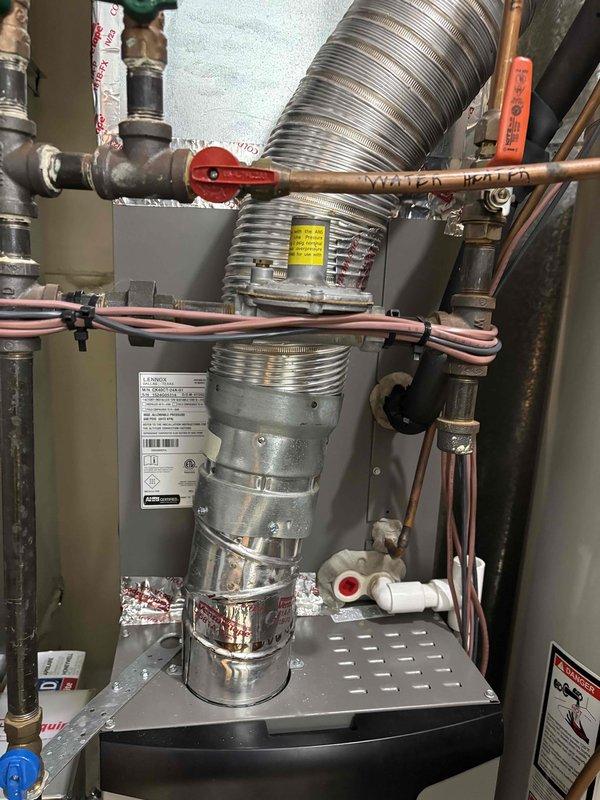 Completed spring AC tune-up on single-zone system with 410A refrigerant. Performed comprehensive maintenance on condenser unit and indoor air handler, including inspection of filter, drain pan, blower motor, electrical wiring, components, coil, and capacitor. Verified amp draw on compressor, motor, and contactor within normal parameters. Confirmed refrigerant temperatures, pressures, and temperature split all operating correctly. Addressed homeowner concern regarding insufficient humidity control by adjusting dehumidifier setting from normal to maximum. All system components tested and operating properly with no mechanical issues found.