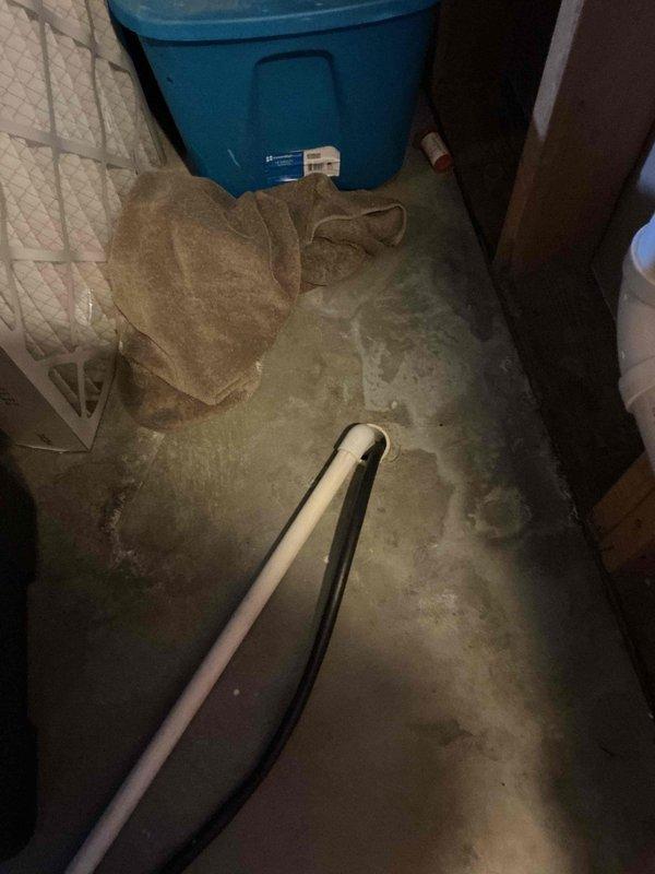 Responded to service call for water leaking from furnace during AC operation. Diagnosed plugged condensate drain line elbow on evaporator coil caused by debris accumulation. Disassembled all condensate drain fittings, cleared debris blockage, reassembled system, and performed flow test with water to verify proper drainage function. System restored to normal operation.