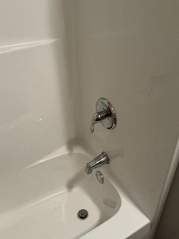 Responded to service call for Gerber shower cartridge replacement. Attempted installation of pre-ordered replacement cartridge but discovered incorrect part had been ordered for the valve assembly. Removed the incorrect cartridge, reassembled the original cartridge components, and reinstalled to restore functionality. A new replacement cartridge with correct specifications has been ordered for future installation.