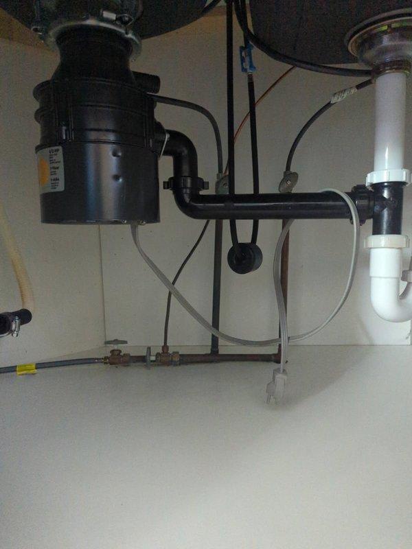 Responded to service call for garbage disposal replacement at residential property. Technician coordinated arrival time with occupant present at the home during the requested afternoon window. Successfully removed existing garbage disposal unit and installed customer-supplied replacement disposal under kitchen sink. Completed all plumbing connections to existing drain lines and P-trap assembly, verified proper electrical connection, and tested unit operation to ensure proper functionality upon completion.