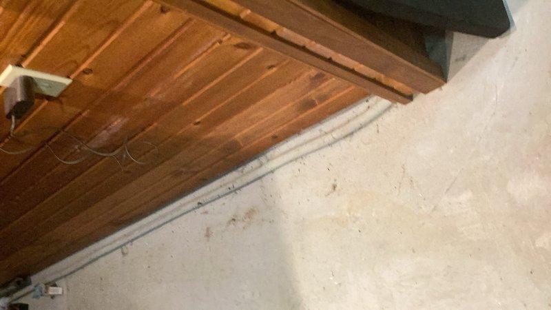 Responded to service call for leaking well pressure tank and pressure gauge in basement utility area. Upon inspection, confirmed active leak at pressure gauge connection on 12-5 gallon well pressure tank. Replaced faulty pressure gauge with new unit, ensuring proper seal and thread connection. Discussed potential relocation options for pressure tank system with customer for future consideration.