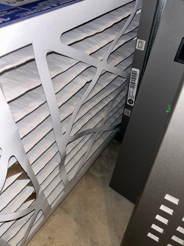 Responded to no cooling complaint on Lennox heat pump system displaying multiple error codes including E311/E312 (obstructed airflow), A800, and C100. Customer reported recent outdoor coil freeze-up condition that had since thawed. Upon arrival, performed comprehensive system inspection and found outdoor condenser coil heavily impacted with dirt and debris, significantly restricting heat transfer capability. Cleaned outdoor coil thoroughly to restore proper airflow and heat rejection.

Initiated system startup and monitored operation under load. Initial refrigeration diagnostics revealed low suction pressure readings that initially suggested potential refrigerant undercharge; however, subcooling and superheat measurements were within manufacturer specifications, indicating adequate refrigerant charge. Proceeded with indoor unit inspection at air handler/furnace location.

Discovered return air filter severely restricted with accumulated dirt and debris, causing significant airflow redu