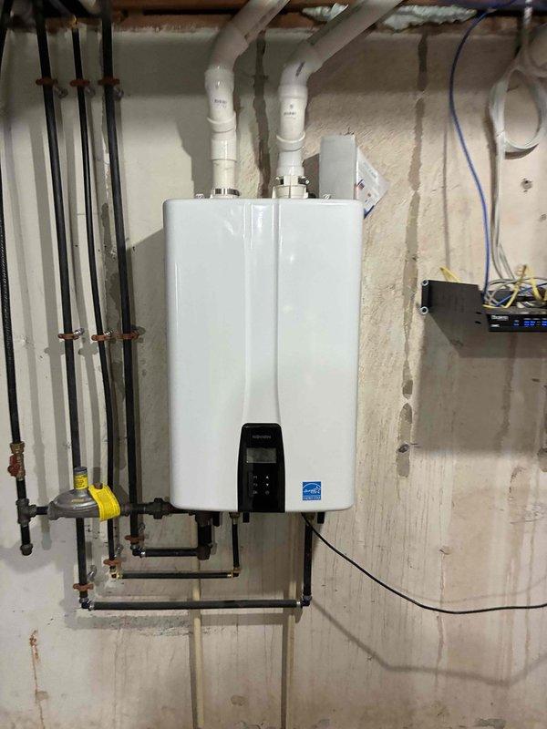 Return visit for air conditioning system not maintaining temperature in upstairs zone. Diagnosed improper airflow configuration with maximum CFM setting at 600, limiting system capacity to approximately 35% output (1 ton of cooling). Adjusted maximum CFM setting to 800, increasing system output to 65% capacity (approximately 2 tons of cooling) for upstairs zone. Verified proper operation with improved airflow and observed temperature beginning to drop. System now operating within normal parameters.