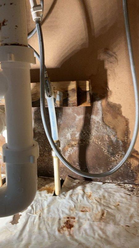Responded to a continuous leak underneath the kitchen sink. Upon inspection, identified a cracked section of CPVC cold water supply line and a leak in the drain piping assembly. Replaced the damaged section of the cold water line and installed a new section of drain piping to eliminate both leak sources. Verified all connections were secure and tested the system to confirm proper operation with no further leakage.