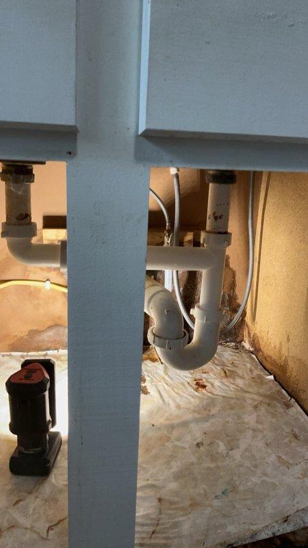 Responded to a continuous leak underneath the kitchen sink. Upon inspection, identified a cracked section of CPVC cold water supply line and a leak in the drain piping assembly. Replaced the damaged section of the cold water line and installed a new section of drain piping to eliminate both leak sources. Verified all connections were secure and tested the system to confirm proper operation with no further leakage.