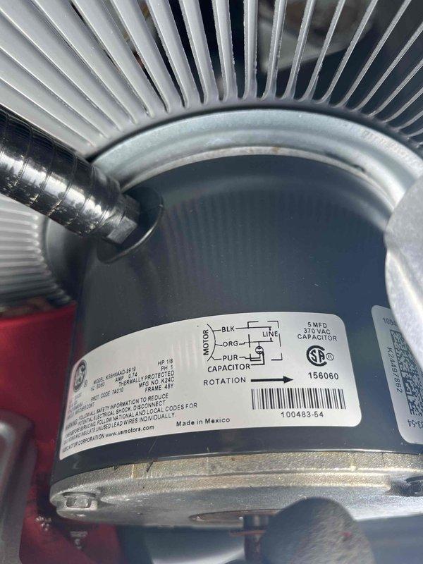 Replaced defective condenser fan motor on residential air conditioning unit under parts warranty. Installed new motor with proper electrical connections and added foam tape to mounting points for vibration reduction, ensuring quiet and efficient operation.