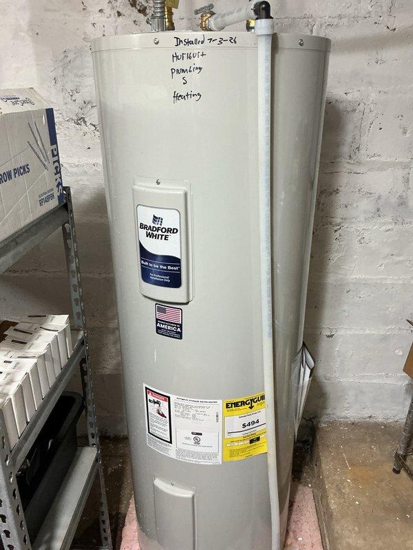 Responded to service call for electric water heater with no hot water production. Upon inspection, diagnosed failed thermostats as the root cause of system failure. Presented multiple repair options to customer, who elected to proceed with complete water heater replacement. Successfully removed existing Richmond brand electric water heater and installed new Bradford White unit. Completed all necessary electrical connections, plumbing connections with copper piping, and verified proper operation of new system. Unit tested and left in full working order.