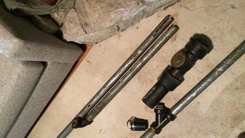 Responded to an active emergency water leak in the basement where water was pouring from a deteriorated galvanized kitchen drain pipe onto the walls and floor. Upon arrival, shut off the water supply to stop ongoing water damage. Identified the source as a rotted-out section of galvanized drain pipe. Cut out the compromised galvanized piping and replaced it with new materials to restore proper drainage function and eliminate the leak.
