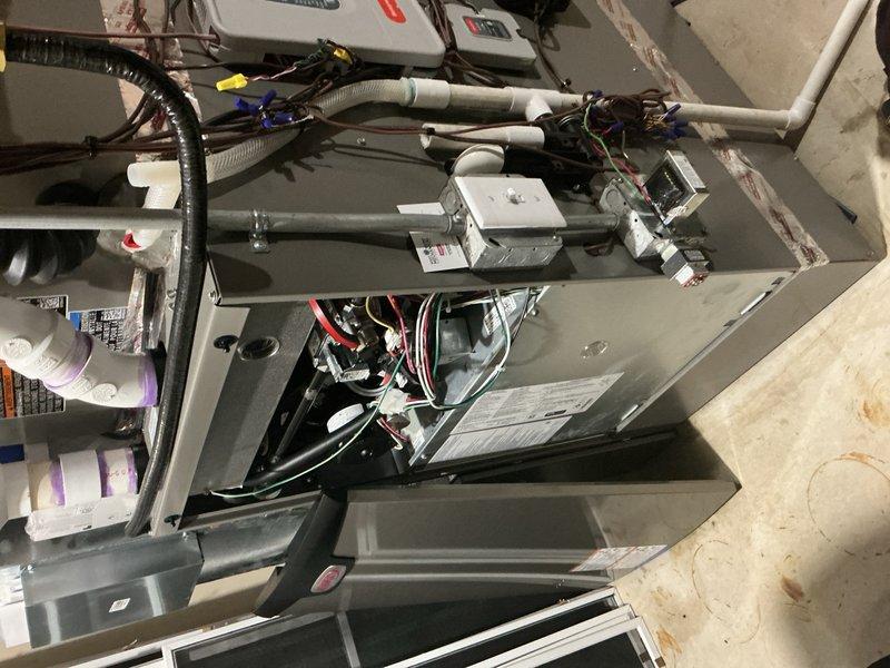 Responded to no-cool complaint on multi-zone HVAC system with third floor not reaching setpoint of 69°F. Replaced malfunctioning damper motor on second floor that was not closing properly. Verified thermostat sensor operation by testing in alternate location with successful temperature response. Replaced dirty air filter, confirmed blower operating at manufacturer specifications, and verified 18-degree delta-T within acceptable range. All zone dampers tested and functioning correctly, with first floor supply vents closed to maximize airflow to upper levels. Airflow to third and fourth floors confirmed adequate upon completion.
