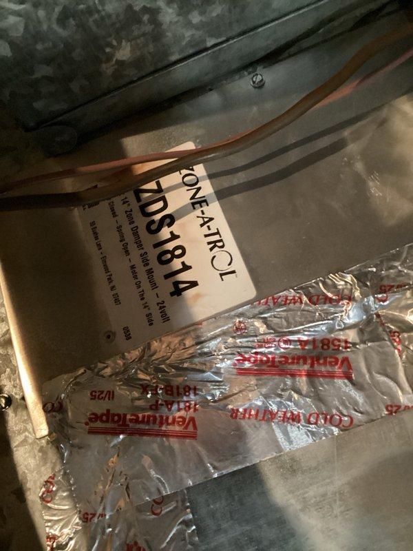 Replaced wiring harness on heat pump unit under parts and labor warranty. Returned to site to replace temperature sensors damaged by rodent activity; one sensor remains on order for future installation. Diagnosed zone system malfunction and determined that three zone damper motors have failed and require replacement rather than the initially suspected zone board. Temporarily configured system by locking main level and second floor zones open while closing basement damper to maintain operation until damper motors can be replaced. Parts have been ordered for zone system repair completion.