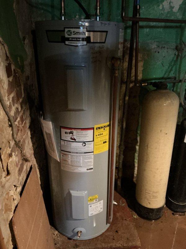 Responded to service call for leaking water heater. Upon arrival, diagnosed a 40-gallon electric A.O. Smith Proline water heater installed in 2021 experiencing active leakage from both heating element ports. Due to the nature and location of the leaks, determined that repair was not viable and complete replacement was necessary. Removed the failed unit and installed new 40-gallon electric water heater. Connected all copper supply lines, electrical connections, and plumbing fixtures. Verified proper operation of new unit and checked for leaks at all connection points. Removed old water heater from premises and left work area clean.