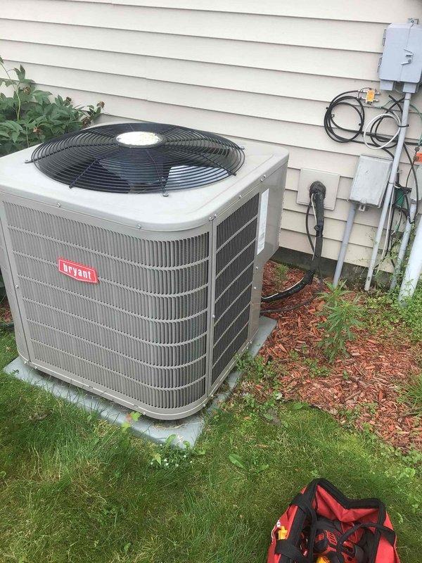 Performed comprehensive air conditioning tune-up on 10-year-old Bryant condensing unit following customer concerns about unusual noises and potential system failure. Conducted complete system evaluation including electrical testing with all readings within manufacturer specifications, replaced air filter with customer-supplied unit, and performed exterior coil cleaning on condensing unit. System operating properly with no abnormal sounds detected during inspection; all components functioning as designed.
