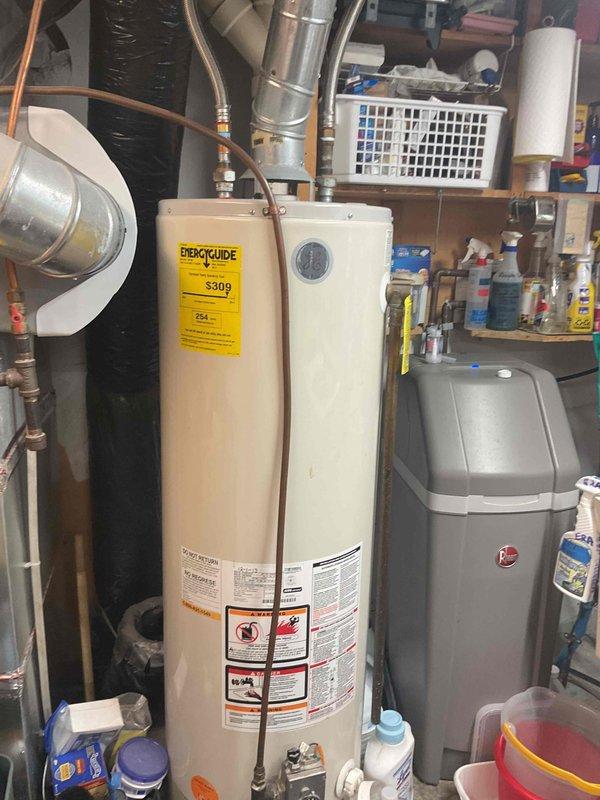 Responded to no cooling complaint on 3-year-old residential air conditioning system. Upon arrival, discovered blown low voltage fuse caused by severely restricted airflow at outdoor condenser unit. Condenser coil was heavily contaminated with dirt and debris, causing system to draw excessive amperage and blow protective fuse. Replaced damaged low voltage fuse and performed thorough condenser coil cleaning using pressurized water to restore proper airflow and heat transfer. Verified system operation with manifold gauges, confirming proper refrigerant pressures and temperatures after service. System restored to normal cooling operation with proper airflow through condenser and stable electrical operation.