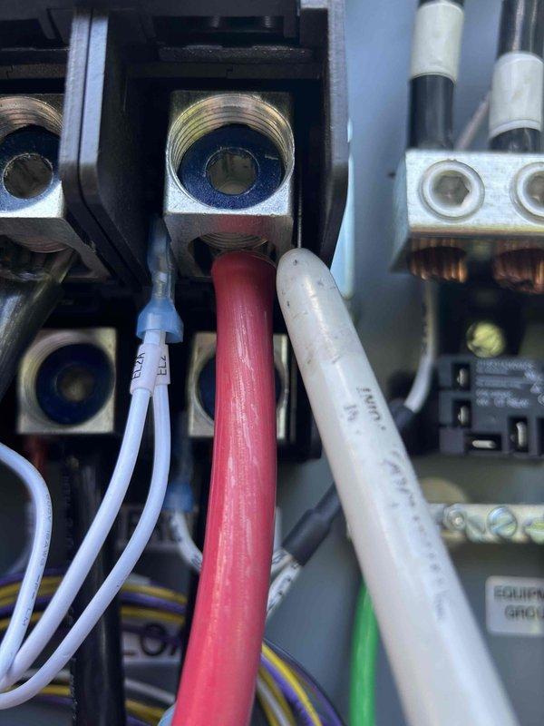 Responded to service call for generator system that failed to activate during power outage. Upon inspection, discovered the second transfer switch was not properly wired to receive signal from generator when operational. Diagnosed that transfer switch lacks necessary communication wiring to trigger automatic switching sequence. Documented electrical connections and terminal blocks within system. All required components are present on-site. Recommended licensed electrician return to complete proper wiring integration between generator control system and secondary transfer switch to restore full automatic transfer functionality across all circuits.