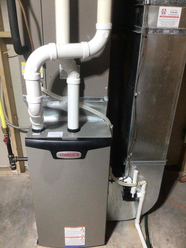 Responded to customer complaint of high-pitched, steady whistling noise occurring when air conditioning system activated and during operation. Upon inspection of Lennox furnace system, identified improperly seated air filter as source of noise. Repositioned filter to proper seated position within filter rack, eliminating air bypass and resolving whistling noise completely.