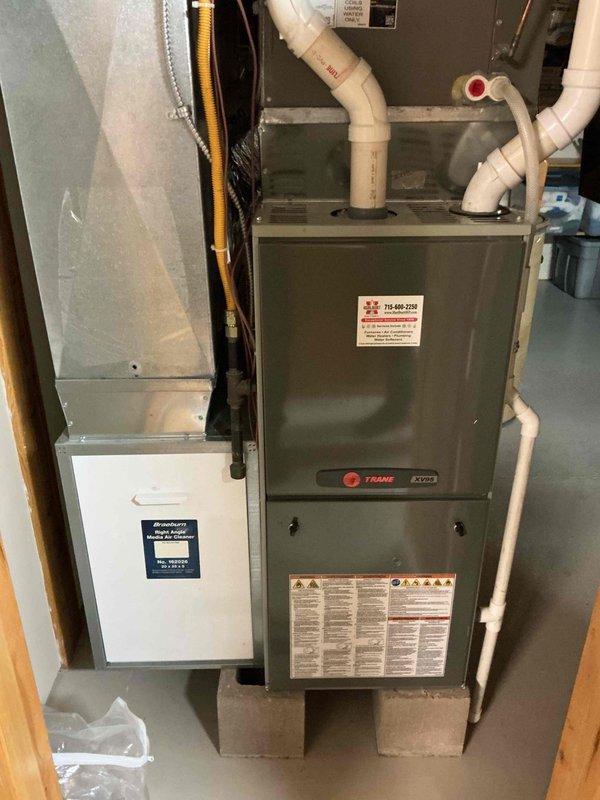 Responded to service call for air conditioning system not running. Diagnosed failed inverter/drive board as cause of system malfunction. Replaced defective board under parts warranty. Upon completion of board replacement, performed system startup and verification procedures. Air conditioning unit now operating properly with normal cooling function restored.