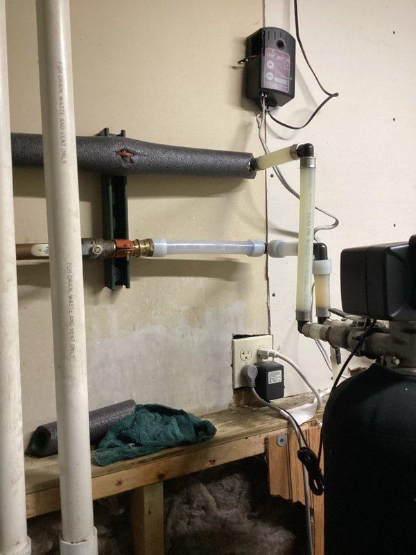 Removed existing acid neutralizer unit from residential water treatment system per customer request. Disconnected all plumbing connections, isolated unit from main water line, and safely extracted neutralizer tank from utility area. Verified proper system isolation and completed full removal of equipment.