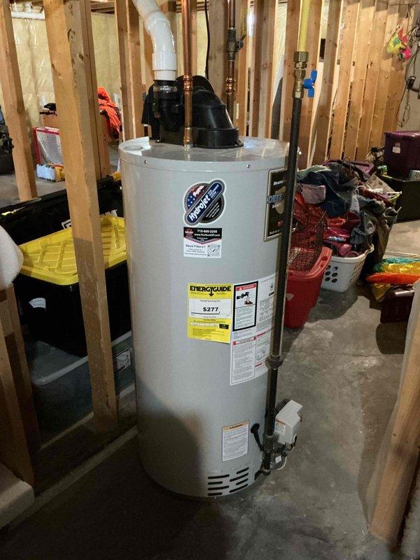 Responded to water leak from furnace installed seven months prior. Upon inspection, identified plugged evaporator drain line causing water to overflow the condensate pan. Cleared blockage from drain hose and upsized drainage system to improve flow capacity and prevent future buildup. Verified proper drainage function upon completion.