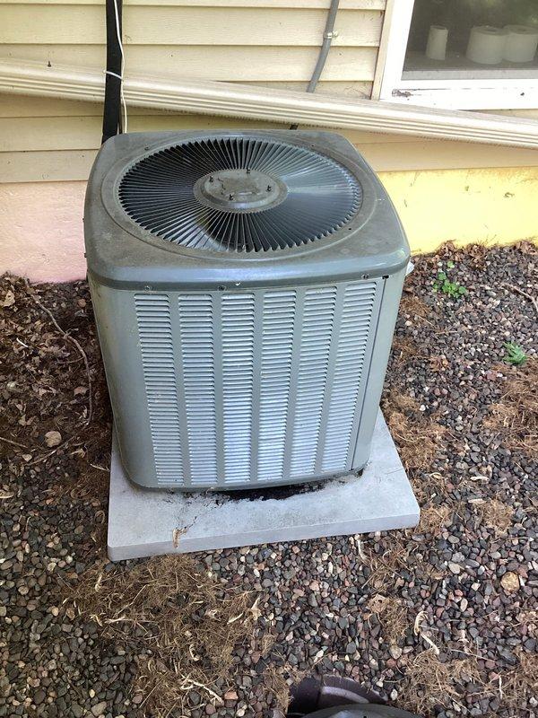 Responded to no cooling complaint on residential air conditioning system. Upon inspection, diagnosed failed capacitor preventing compressor operation. Replaced defective capacitor with new unit, verified proper electrical readings, and confirmed adequate refrigerant charge levels. System tested and restored to normal cooling operation with all components functioning within manufacturer specifications.