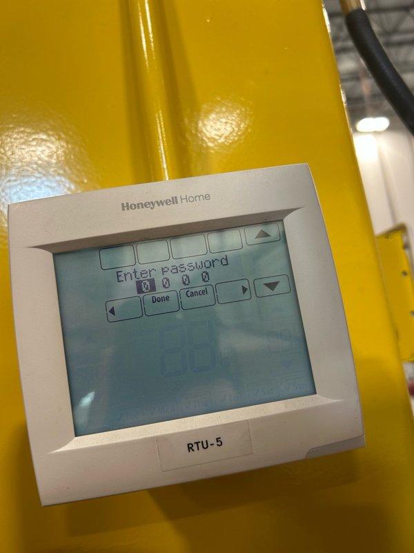 Responded to no cool call on Carrier rooftop unit. Upon arrival, found Honeywell TH8321WF1001 thermostat locked with password protection and no screen display. Customer had no access credentials and password recovery was not available. Determined thermostat could not be reset or unlocked without proper credentials. Removed existing locked thermostat and installed replacement unit to restore system control and operation. Verified proper communication between new thermostat and RTU, confirmed cooling function restored.