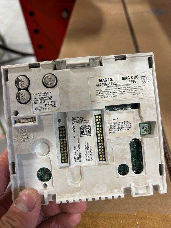 Responded to no cool call on Carrier rooftop unit. Upon arrival, found Honeywell TH8321WF1001 thermostat locked with password protection and no screen display. Customer had no access credentials and password recovery was not available. Determined thermostat could not be reset or unlocked without proper credentials. Removed existing locked thermostat and installed replacement unit to restore system control and operation. Verified proper communication between new thermostat and RTU, confirmed cooling function restored.