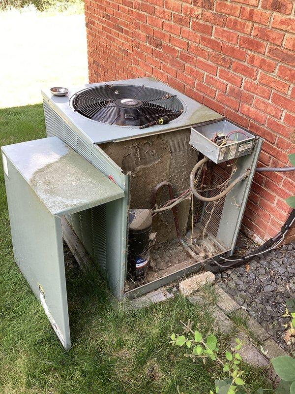 Responded to no cooling complaint on 17-year-old Ruud air conditioning system. Diagnosed and found failed run capacitor and low refrigerant charge preventing proper system operation. Replaced defective capacitor and added refrigerant to restore cooling function, providing temporary solution to get unit through remainder of cooling season.