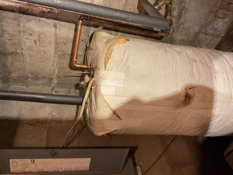 Responded to no cooling complaint on residential air conditioning system. Upon arrival, found indoor temperature in mid-80s with system running but struggling to achieve setpoint of 73°F after extended period of being off during occupant vacation. Performed comprehensive system evaluation including visual inspection of indoor and outdoor equipment. Verified air filter was clean and recently replaced. Inspected outdoor condensing unit and confirmed coil was clean with no visible obstructions. Utilized FLIR thermal imaging camera to measure supply and return air temperatures, confirming approximately 22°F temperature split across evaporator coil, indicating refrigeration circuit was operating within normal parameters and producing adequate cooling capacity.

Conducted thorough airflow assessment throughout occupied space. Identified primary issue as severely restricted airflow due to multiple supply grilles and return air openings blocked by household items and belongings. Restricted air