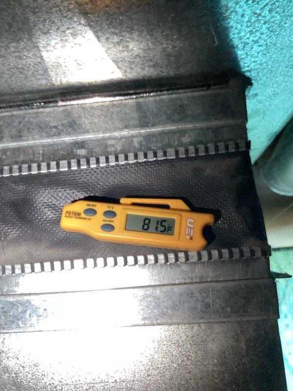 Responded to a no cooling complaint on a 6-year-old HVAC system with house temperature reaching 90 degrees and no airflow despite unit power being on. Upon diagnosis, identified and replaced a failed capacitor that was preventing the system from operating properly. Performed temperature measurements confirming system return air at 67.6°F and supply air temperature at 81.5°F during testing. Noted the outdoor unit coil was moderately dirty but unable to perform complete cleaning due to non-functional water spigot at location. Enrolled customer in rewards program for future maintenance benefits.