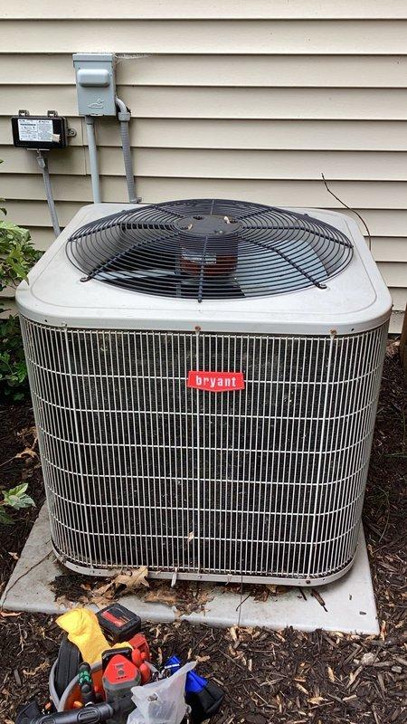 Responded to low refrigerant condition on Bryant air conditioning system. Added approximately 2 pounds of R-410A refrigerant to restore proper system charge. Verified refrigerant levels were within manufacturer specifications and confirmed unit was providing adequate cooling operation as temporary solution until scheduled full system replacement.