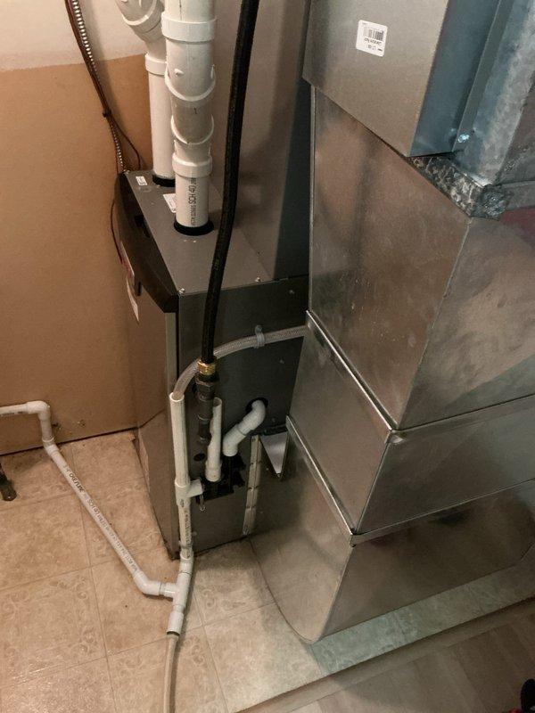 Responded to callback for water heater installed two weeks prior experiencing severely reduced water pressure throughout the home. Upon inspection, diagnosed factory-defective dip tube causing inadequate water flow from the unit. Removed and replaced faulty dip tube, restoring full water pressure and proper hot water distribution to all fixtures.