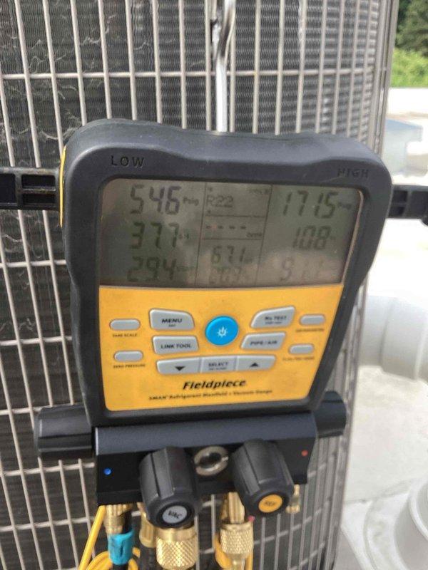 Completed preventive maintenance tune-up on rooftop Payne air conditioning unit containing R22 refrigerant. Performed comprehensive system inspection with diagnostic testing revealing elevated temperature readings and potential refrigerant charge concerns. Unit currently operational but showing signs of age including exterior corrosion on mounting platform and weathering on condenser components, with customer planning future replacement and declining quote at this time.