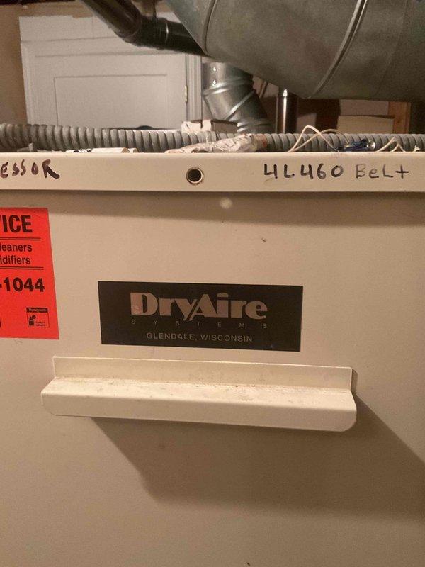 Completed annual air conditioning tune-up on DryAire dehumidification system. Found and replaced failed capacitor and dirty air filters located above stairway requiring extended ladder access. System tested and verified operational with multimeter readings confirming proper electrical performance.