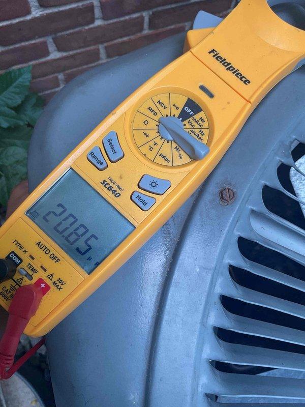Completed annual air conditioning tune-up on DryAire dehumidification system. Found and replaced failed capacitor and dirty air filters located above stairway requiring extended ladder access. System tested and verified operational with multimeter readings confirming proper electrical performance.