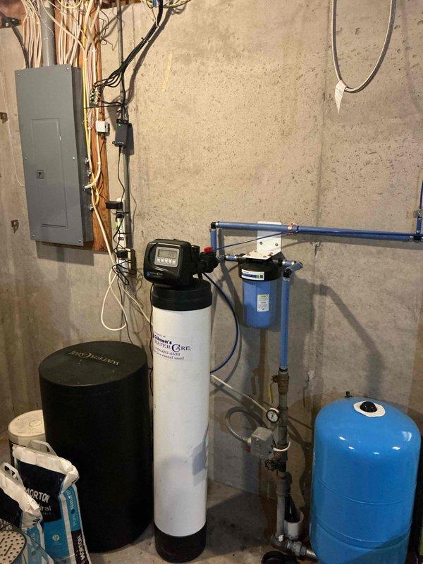 Replaced a 20-year-old leaking 50-gallon natural gas water heater with a new Bradford White 10-year warranty power vent unit. Installation included all necessary parts, copper piping connections, electrical wiring, venting components, proper permitting, and disposal of the old unit. The new power vent water heater was installed in the basement utility area and tested for proper operation.