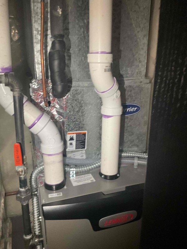 Performed comprehensive AC tune-up on Lennox system in response to concerns about uneven cooling on upper level and request for airflow and refrigerant verification. Upon inspection, found system completely empty of refrigerant. Due to age of equipment and cost-effectiveness analysis, recommended and completed full system replacement with new Carrier unit, including proper refrigerant charging, venting installation with PVC piping, gas line connection with safety shutoff valve, and electrical wiring. New installation tested and verified operational with proper airflow distribution throughout home.