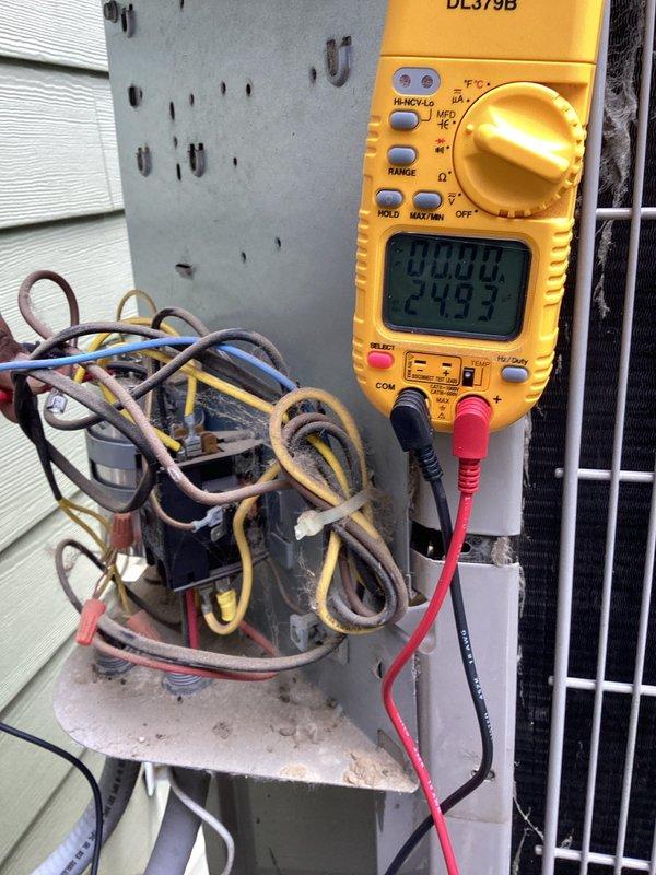 Responded to no cooling complaint on residential air conditioning system over 10 years old. Upon arrival, confirmed outdoor unit was not operating. Diagnostic testing revealed failed dual run capacitor with visible corrosion and deterioration. Further inspection identified condenser fan motor with failing bearings and reduced performance. Replaced defective capacitor and condenser fan motor. Verified proper electrical connections, tested system operation, and confirmed unit cooling normally with correct voltage readings at contactor.