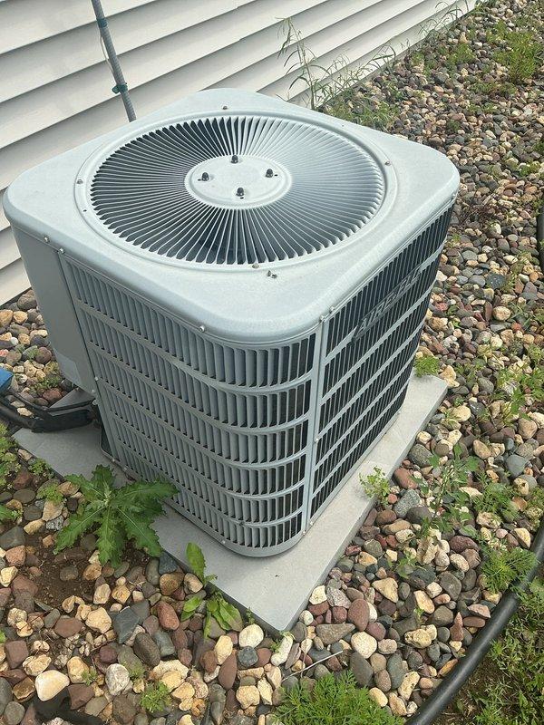 Responded to no cooling complaint on 16-year-old residential air conditioning system. Upon arrival, found outdoor condenser unit operational but refrigerant line set severely kinked, restricting flow by approximately 75%. System showed reduced temperature split of 10 degrees across evaporator coil, and previous water leakage at furnace had occurred but was dry at time of inspection. Discussed repair versus replacement options with homeowner, who elected to proceed with full system replacement due to age of equipment and extent of refrigerant line damage.