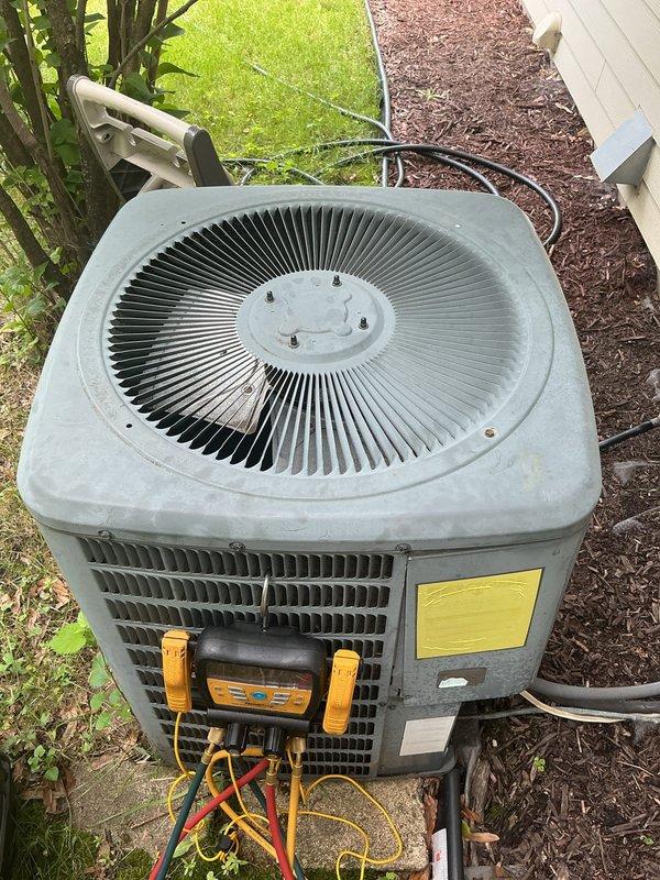 Responded to no cooling complaint on 10-15 year old AC unit that was short cycling after being serviced by another company. Upon inspection, found system pressures exceeding 500 psi, indicating either severe overcharge from previous service or compressor failure. Diagnosed that excessive pressures were causing unit to short cycle and fail to cool properly. Connected manifold gauges to verify refrigerant pressures and confirm diagnosis. Inspected electrical control panel and condenser unit components. Advised that unit requires replacement due to age and severity of issue. Scheduled follow-up appointment to provide estimate for new AC condenser and options for complete system replacement.