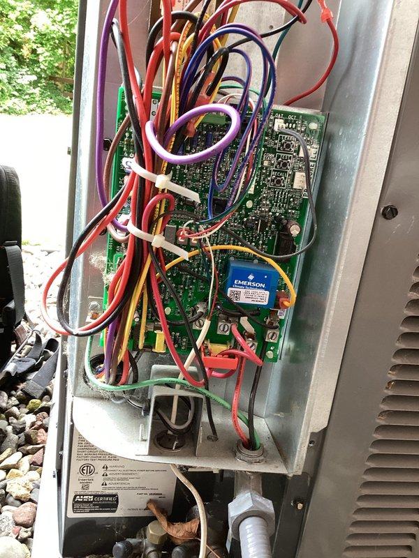 Responded to no-cooling complaint on 2-year-old Goodman air conditioning system that would not restart after cycling off. Upon arrival, found thermostat set to 66 degrees with system not running and no error codes displayed. Performed diagnostic testing including amp draw measurements on compressor, verified capacitor functionality, and inspected control board and electrical connections. All electrical components tested within normal operating parameters with no mechanical or electrical failures identified. Determined system was likely experiencing thermal overload protection lockout due to excessive runtime attempting to maintain unrealistic setpoint during high ambient temperature conditions. Advised proper thermostat settings around 70 degrees to prevent system from overworking and cycling on thermal protection, which would explain intermittent operation requiring breaker resets to restore functionality.