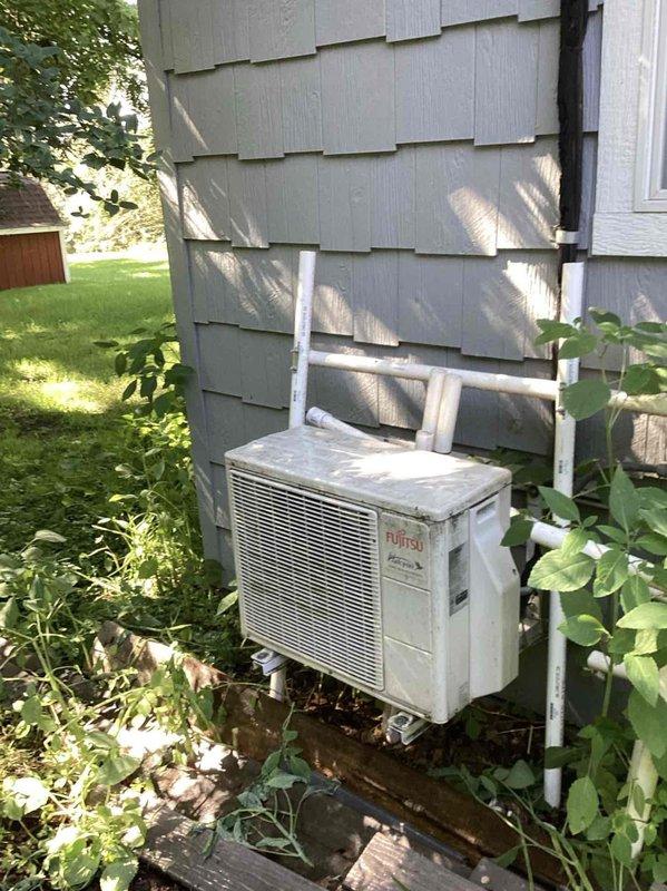 Completed Family Rewards cooling maintenance visit on residential HVAC system consisting of two mini-split units and one heat pump. Performed operational checks on all equipment, noting minor fan buildup on living room head unit that customer declined service for at this time. Replaced customer-supplied air filter, rinsed all outdoor condenser units, and verified proper system operation across all zones. All equipment functioning within normal parameters upon completion of tune-up service.