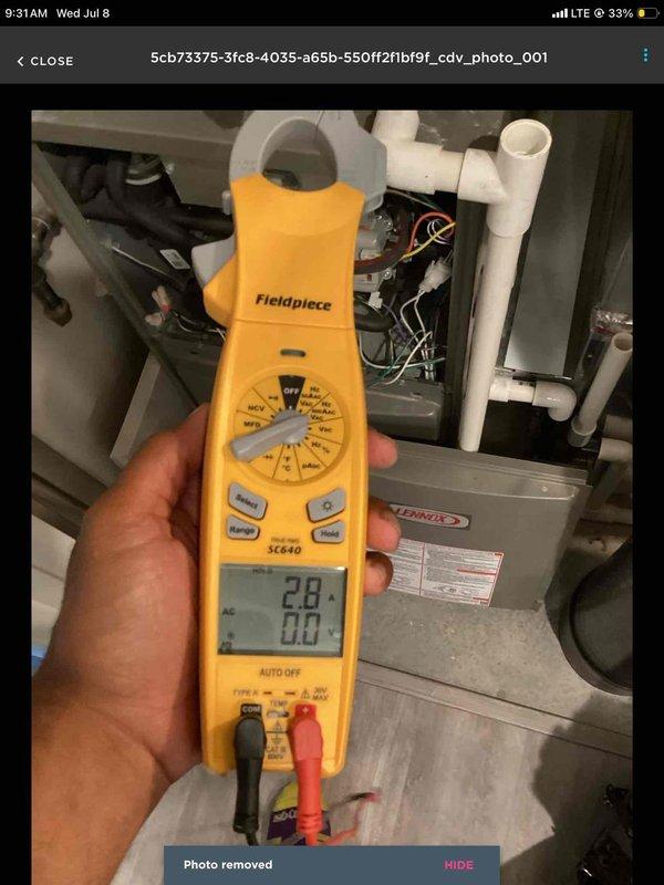 Completed comprehensive tune-up on seven year-old furnace and air conditioning system. Furnace operating properly with good amp draws, safe combustion, clean filter, and proper temperature split; cleaned flame sensor and verified igniter readings within specifications. Air conditioning unit showed low temperature split upon inspection; outdoor condenser coil was heavily soiled and cleaned thoroughly. System charge verified low; added refrigerant to bring system to proper operating levels. All equipment now operating within manufacturer specifications.