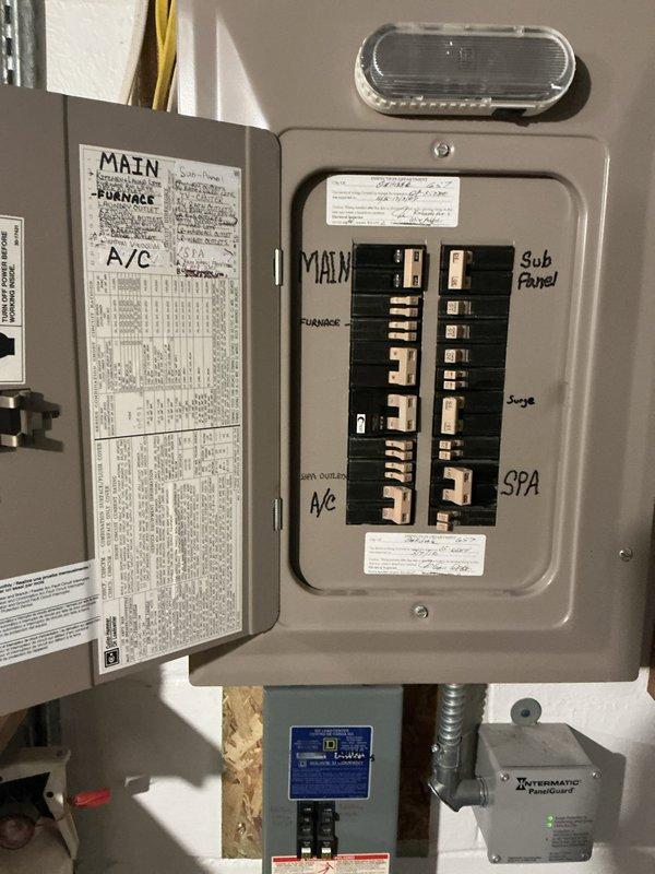 Performed AC tune-up on 21-year-old system and discovered critical safety hazard: furnace heat exchanger rusted through from inside out, actively leaking carbon monoxide during operation, requiring immediate shutdown of unit. AC system evaluation revealed high refrigerant pressures caused by restriction in lineset between condenser and evaporator coil, with system containing obsolete refrigerant. Documented electrical panel configuration, water heater installation, and overall mechanical room layout. Red-tagged furnace as unsafe to operate and scheduled same-day estimate for complete furnace and air conditioning system replacement due to age, safety concerns, and refrigerant obsolescence.