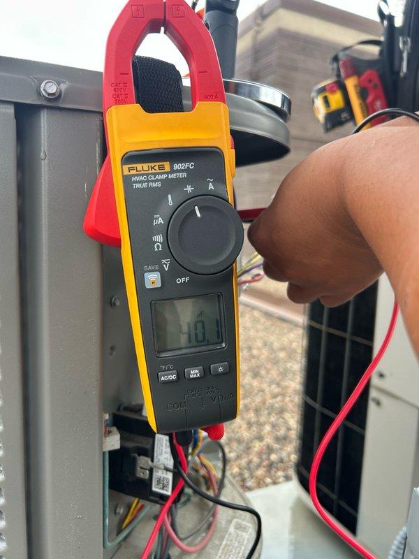 Performed comprehensive AC maintenance inspection on rooftop unit. Accessed roof via front desk key and completed full system evaluation including thermostat operation, blower assembly, outdoor coil, electrical components, contactor, capacitor, condensate drain, refrigerant performance, and temperature split measurements. Customer reported excessive fan motor noise; adjusted blower motor to lower speed setting, which reduced noise levels while maintaining adequate airflow and refrigeration performance. Verified filter was recently changed by customer. All electrical connections tested and confirmed secure. System operating within normal parameters at time of service. Recommended maintaining regular filter changes, keeping indoor and outdoor coils clean, and scheduling routine preventive maintenance to ensure continued optimal performance.