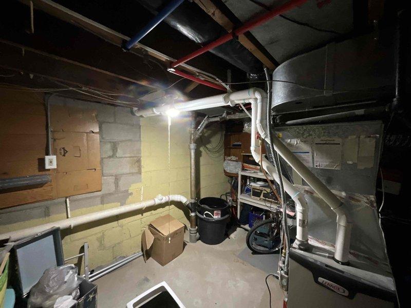 Responded to customer inquiry regarding leaking water heater in basement utility area. Conducted on-site assessment of existing unit, which exhibited small leak but remained operational. Evaluated electrical service capacity at breaker panel to determine feasibility of various replacement options. Provided comprehensive estimate including both tankless and traditional tank-style water heater configurations, with specific pricing for electric and standard atmospheric vent models to allow customer to make informed decision on proactive replacement before complete failure occurs.
