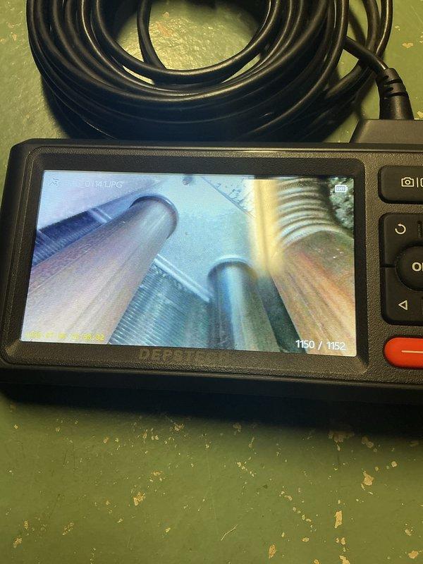 Completed routine cooling maintenance on a 22-year-old R22 air conditioning system. Obtained equipment documentation photos of make, model, and serial number information. Testing revealed the dual capacitor was operating outside manufacturer specifications, which was replaced to restore proper system operation. Comfort advisor was scheduled due to the age of the unit and R22 refrigerant type.
