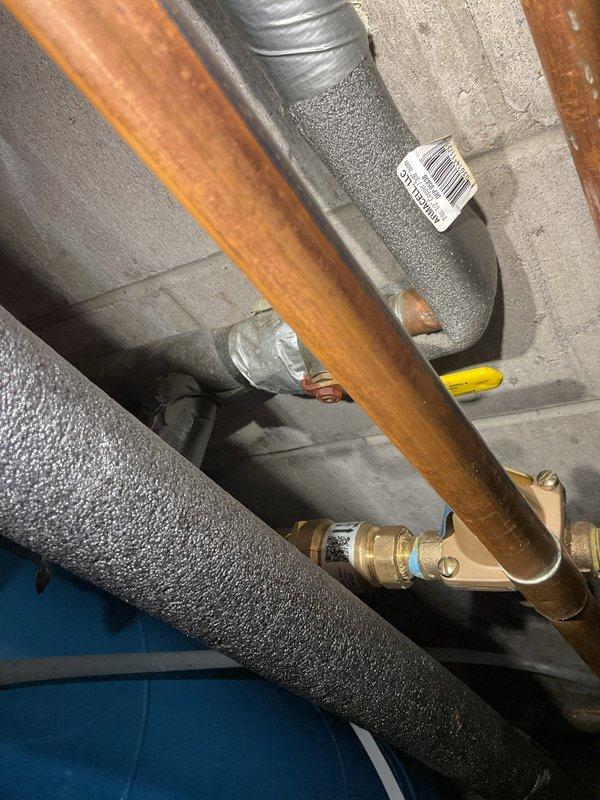 Completed follow-up service call to address previous water discharge from relief valve. Replaced auto fill valve and backflow preventer to correct system over-pressurization issue. Refilled hydronic system, purged air by leaving automatic vent open on expansion tank, and tested all heating zones for proper operation. Installed auto filter for boiler and new pressure relief valve. All zones operated as designed with no active leaks observed at time of service.