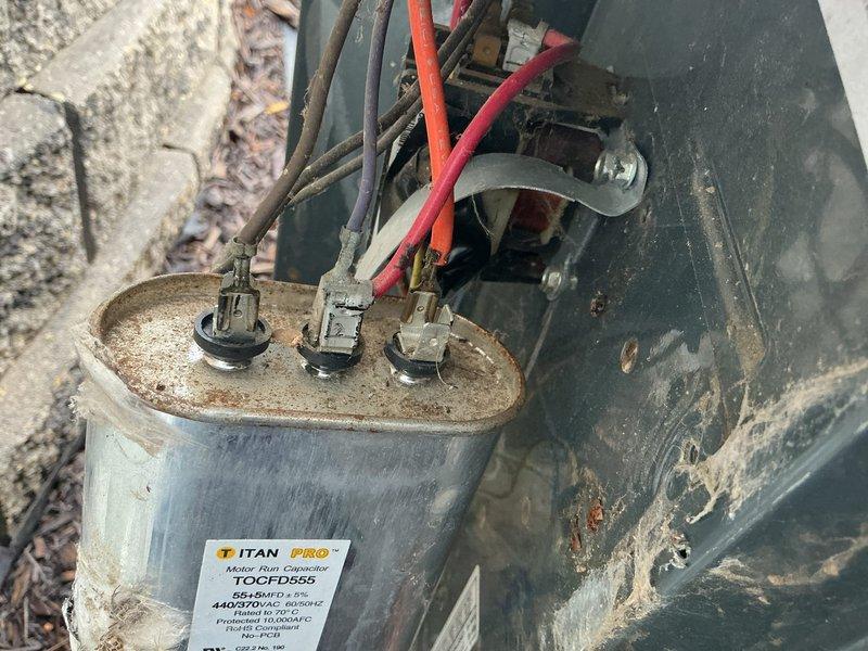 Responded to no cooling complaint on 22-year-old R22 air conditioning system. Upon inspection, found failed capacitor with evidence of previous replacement. Replaced capacitor and tested system operation. Post-repair diagnostics revealed compressor drawing excessive amperage beyond maximum rated specifications and high-side refrigerant pressure exceeding 250 psi (normal range 150-180 psi), indicating compressor failure and system restriction. Advised customer that capacitor replacement is temporary measure without guarantee due to underlying compressor failure. Explained risk of indoor coil freezing and potential water damage to furnace. System contains obsolete R22 refrigerant. Recommended complete system replacement and scheduled estimate appointment.