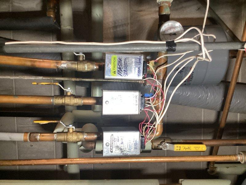 Responded to no hot water complaint with boiler running continuously. Diagnosed malfunctioning mixing valve causing improper temperature regulation between in-floor heating loops and domestic indirect tank. During indirect tank heating cycle, supply water was incorrectly heating the in-floor system due to valve failure to properly mix water to correct temperature setpoint. Provided estimate for mixing valve replacement to resolve cross-heating issue and restore proper system operation.
